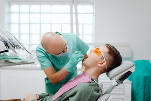 Dentist-examing-patients-teeth-Jan-blog